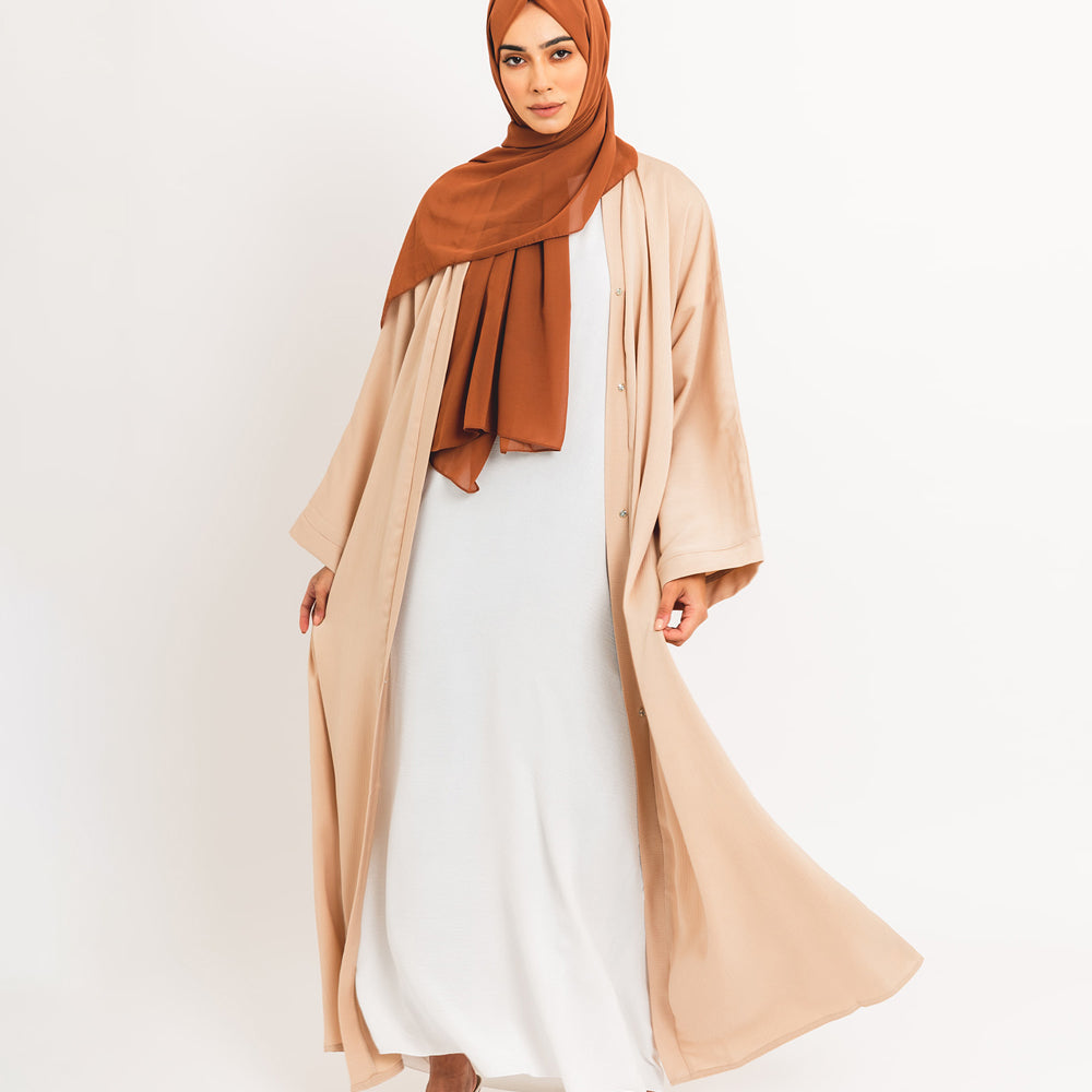 Apri la crema essenziale abaya