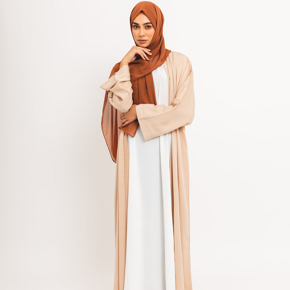 Apri la crema essenziale abaya