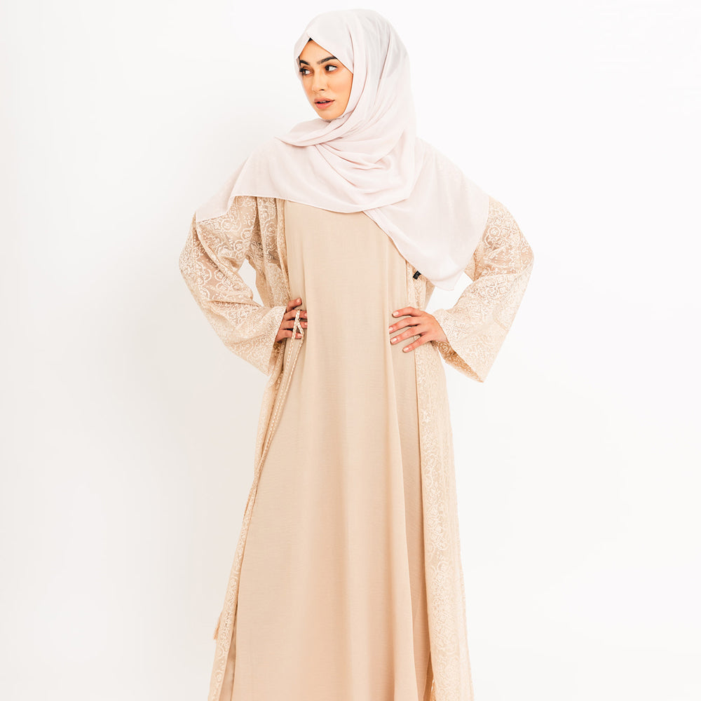 Abaya in pizzo color crema aperto