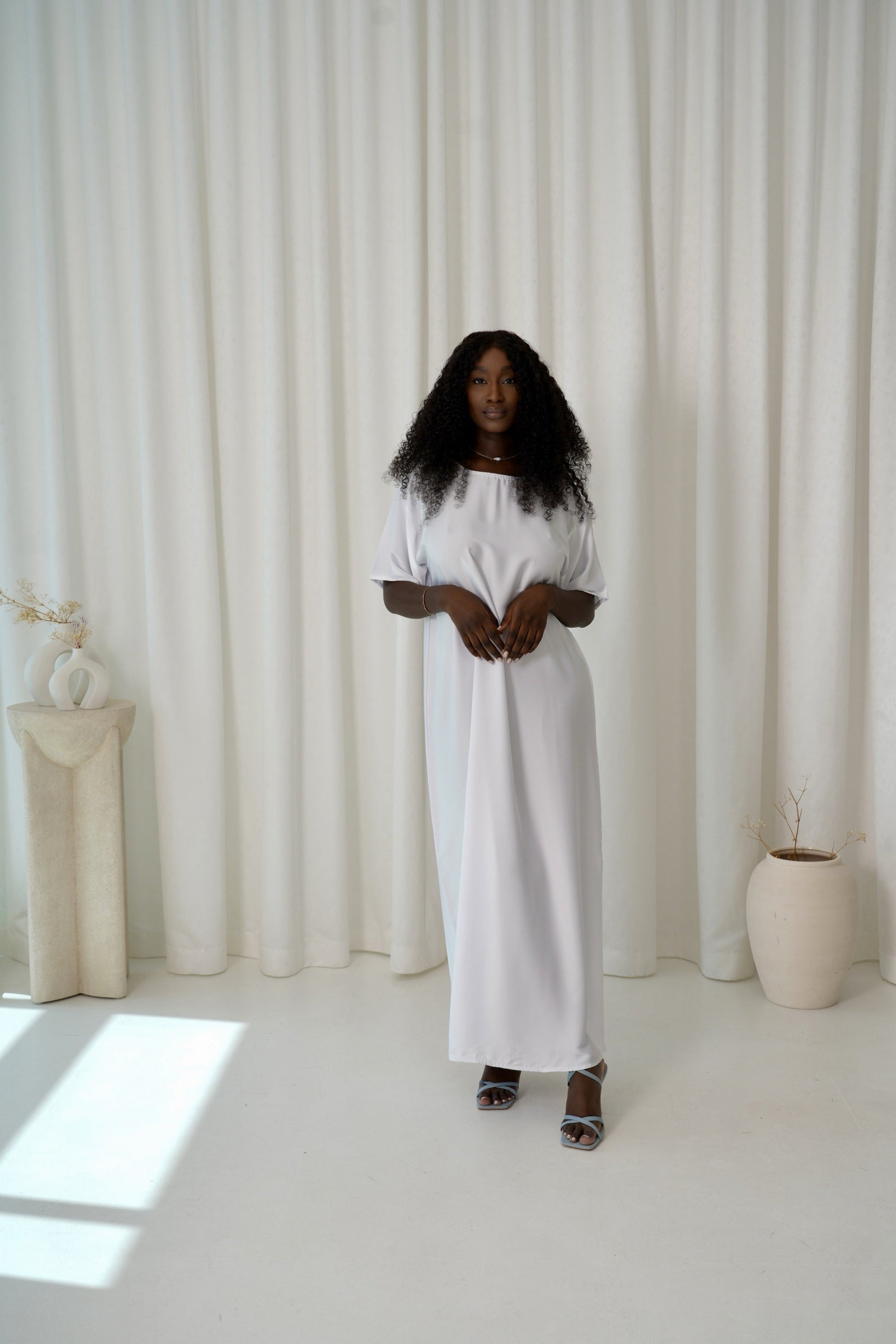 Abito in raso bianco